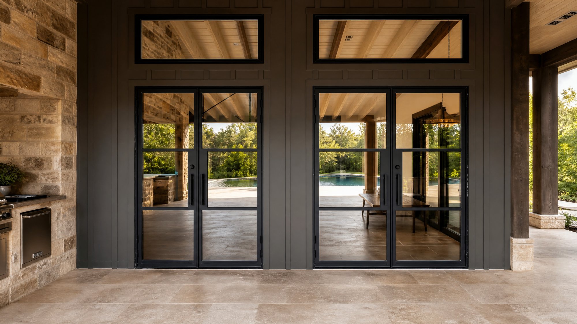 Steel patio doors opening to a pool